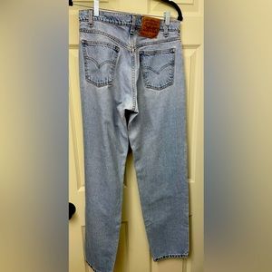 Levi’s 550 Light blue worn boyfriend jeans. Size 32 x 34.